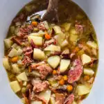 slow cooker ham and potato soup in a Crockpot with vegetables