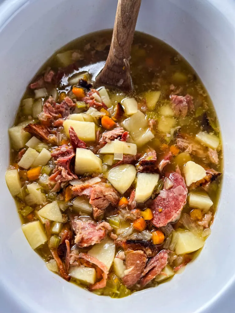 slow cooker ham and potato soup in a Crockpot with vegetables