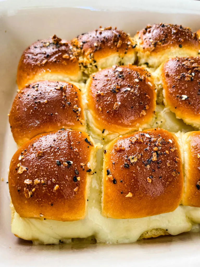 turkey cheese sliders in a baking dish