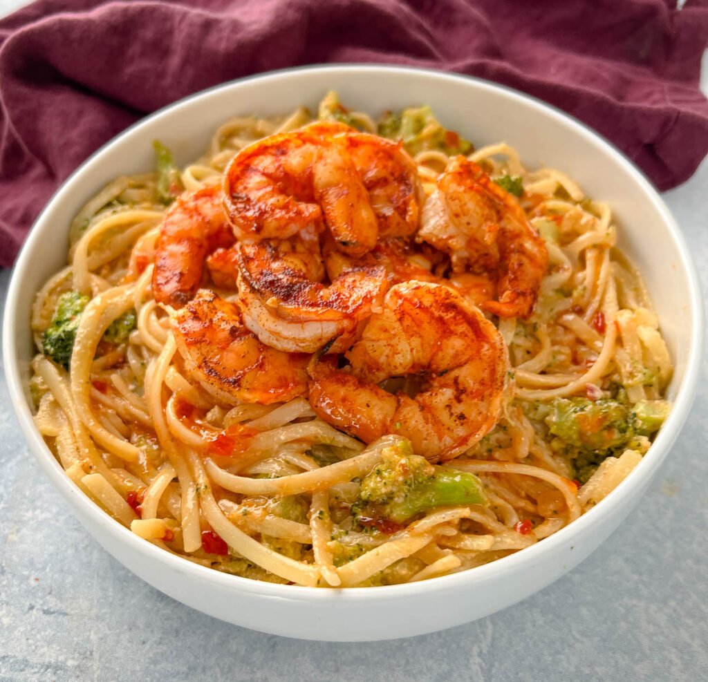 bang bang shrimp pasta in a white bowl