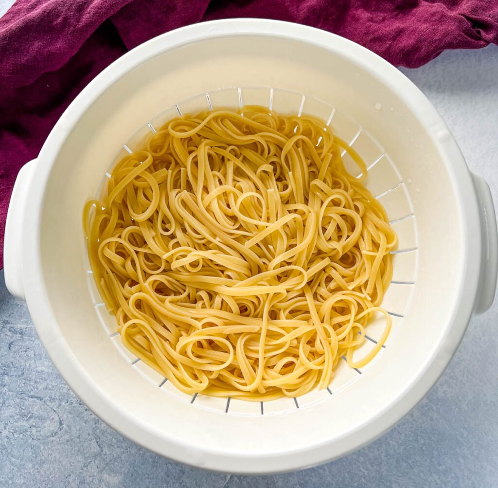 cooked pasta in a colander