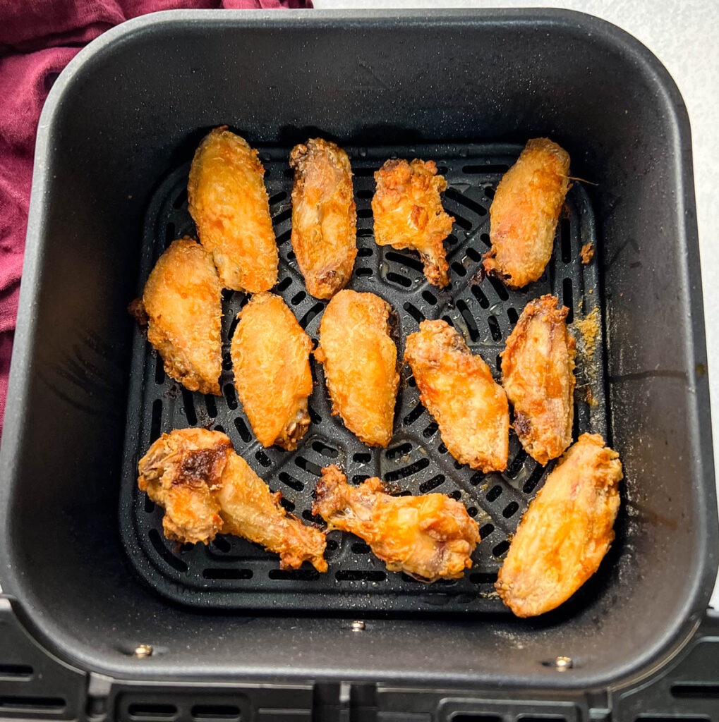 cooked chicken wings in an air fryer