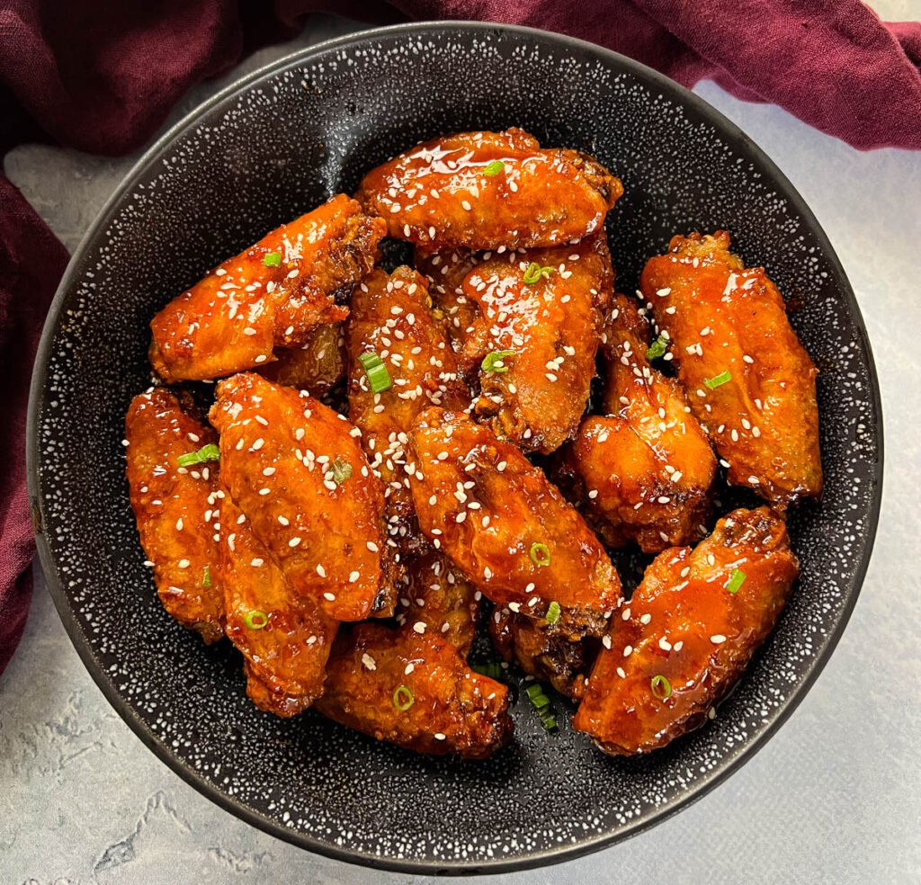 honey garlic chicken wings in a bowl