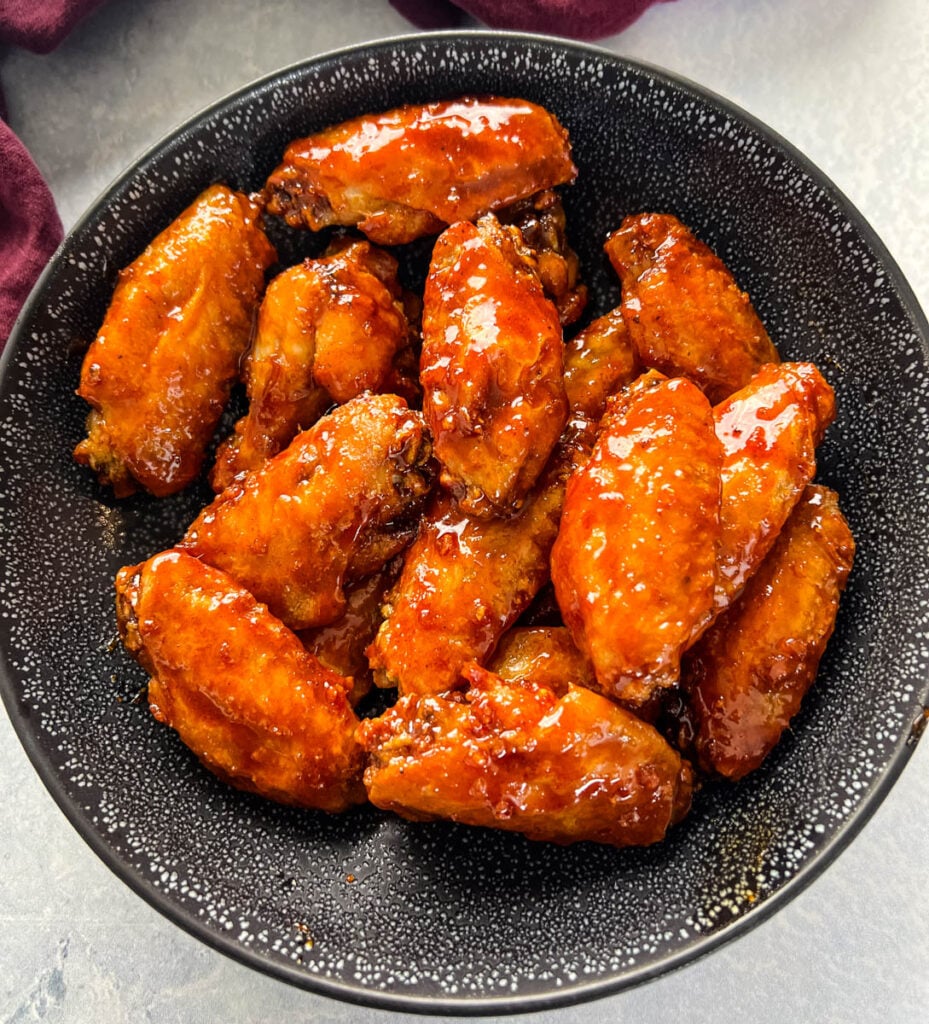 honey garlic chicken wings in a bowl