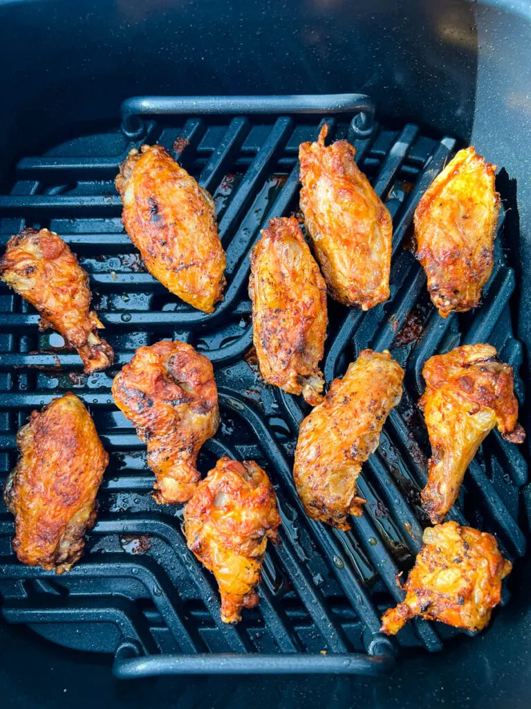 https://www.staysnatched.com/wp-content/uploads/2022/02/ninja-foodi-indoor-grill-chicken-wings-1-1-768x1024.jpg.webp