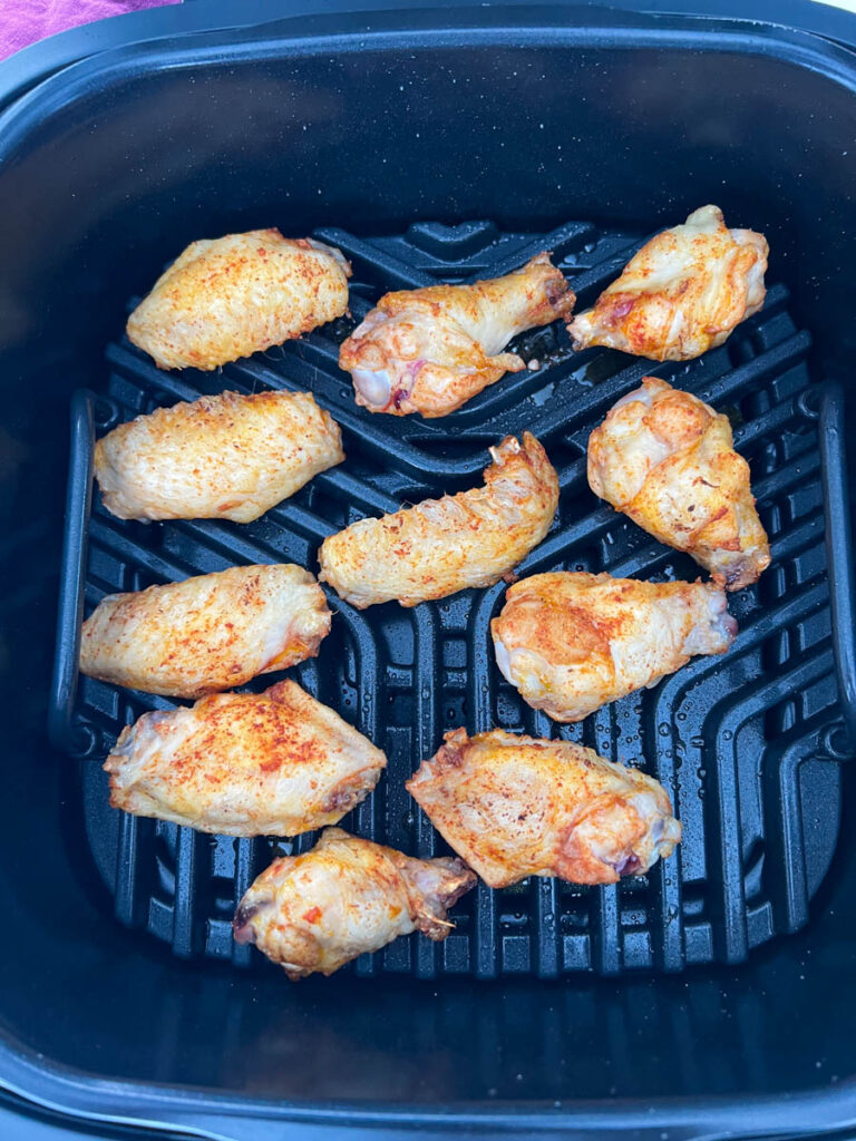 raw chicken wings on indoor smokeless Ninja Foodi Grill