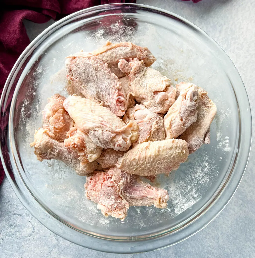 chicken wings in a glass bowl