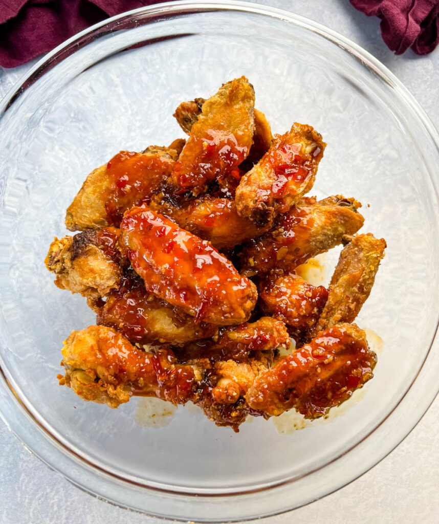 sweet chili wings in a glass bowl