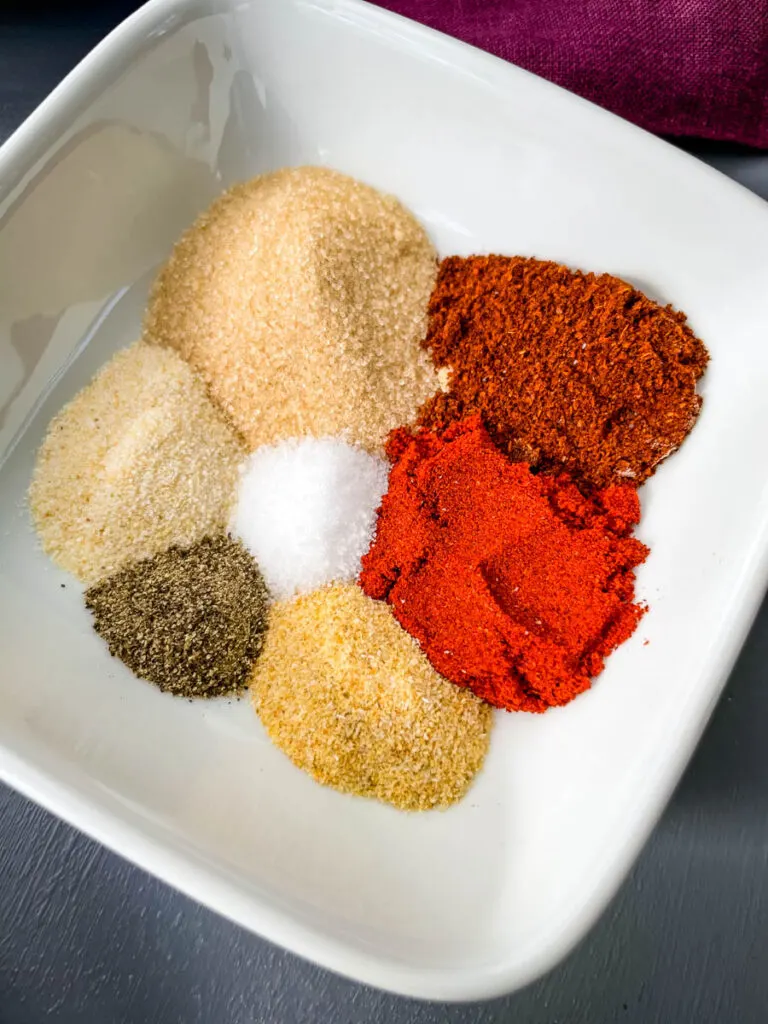 spices for chicken dry rub in a white bowl