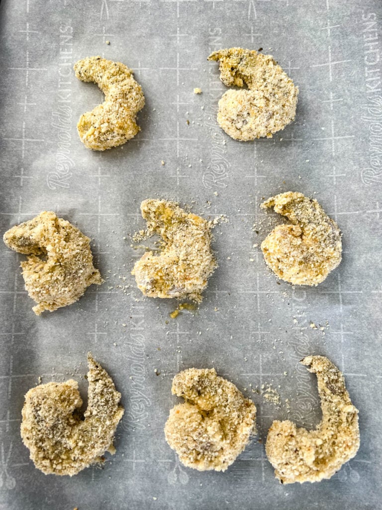 shrimp parmesan Parmigiana on a sheet pan