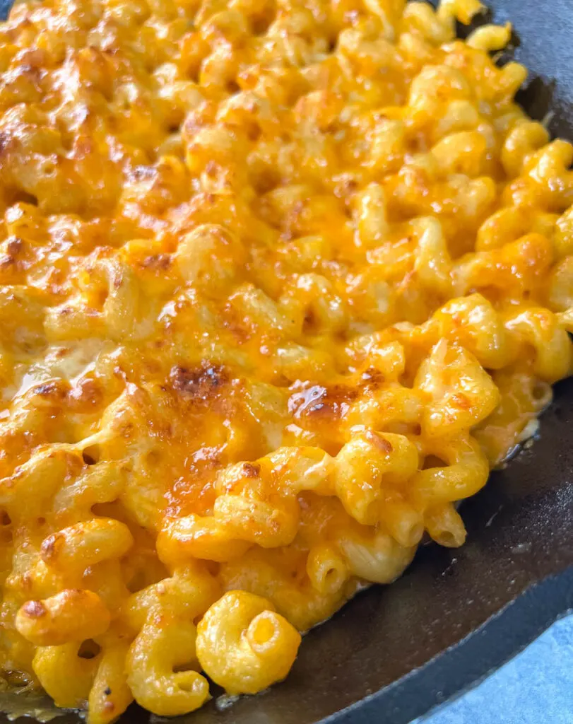 smoked mac and cheese in a cast iron skillet