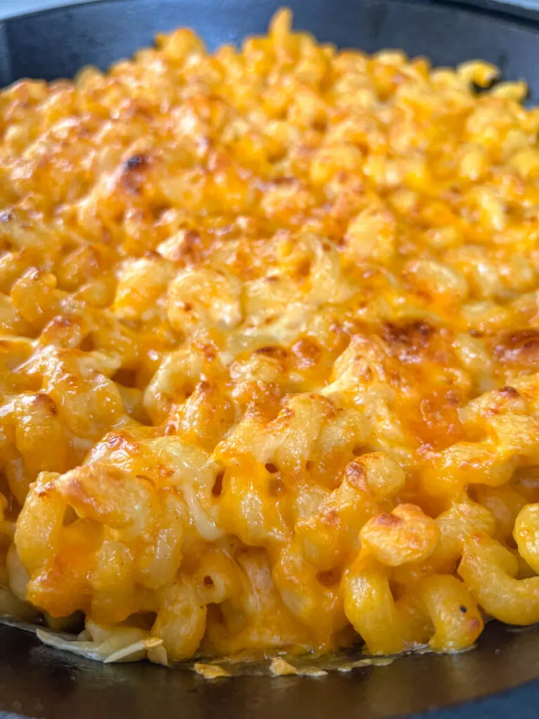 smoked mac and cheese in a cast iron skillet