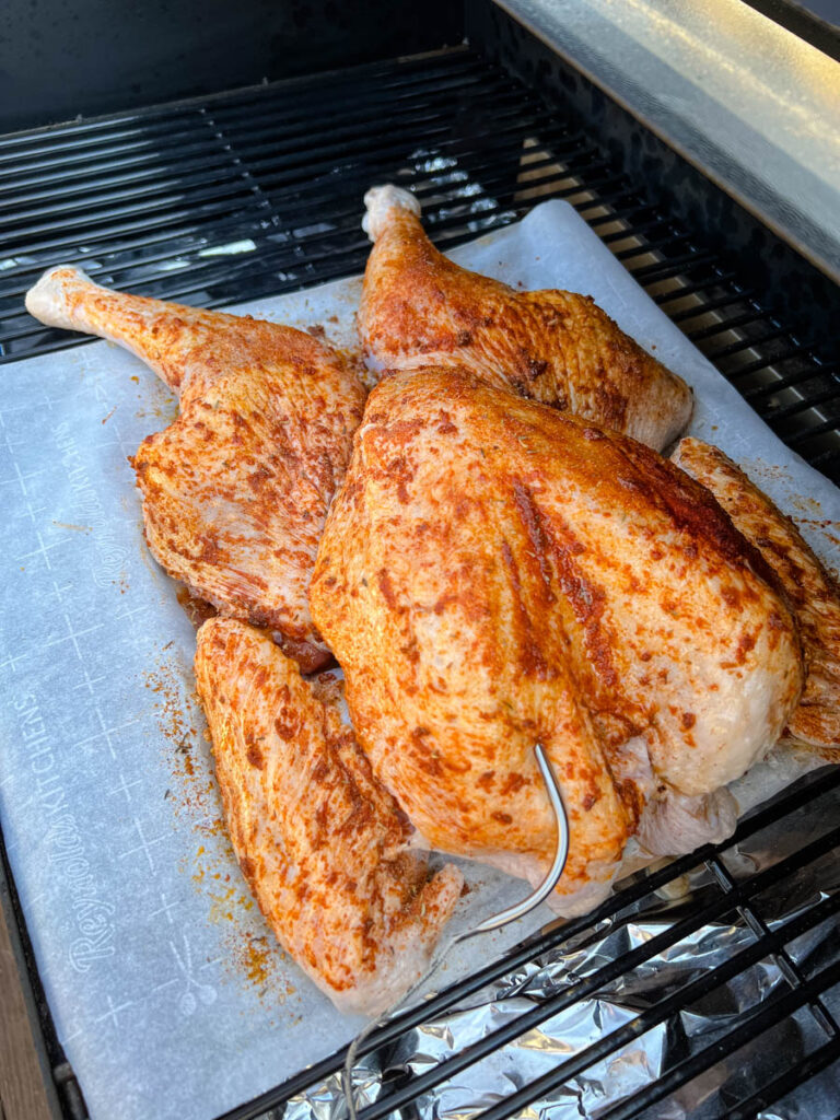 raw turkey on Traeger smoker grill