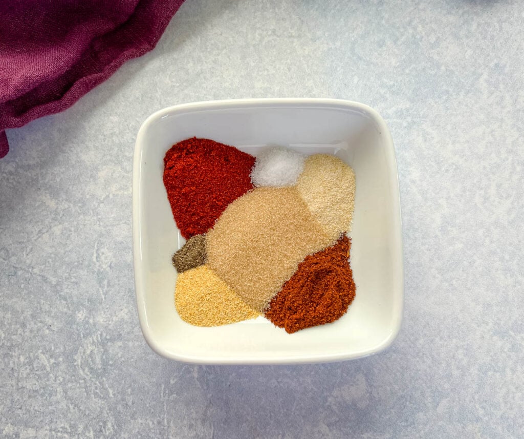 turkey rub spices in a white bowl