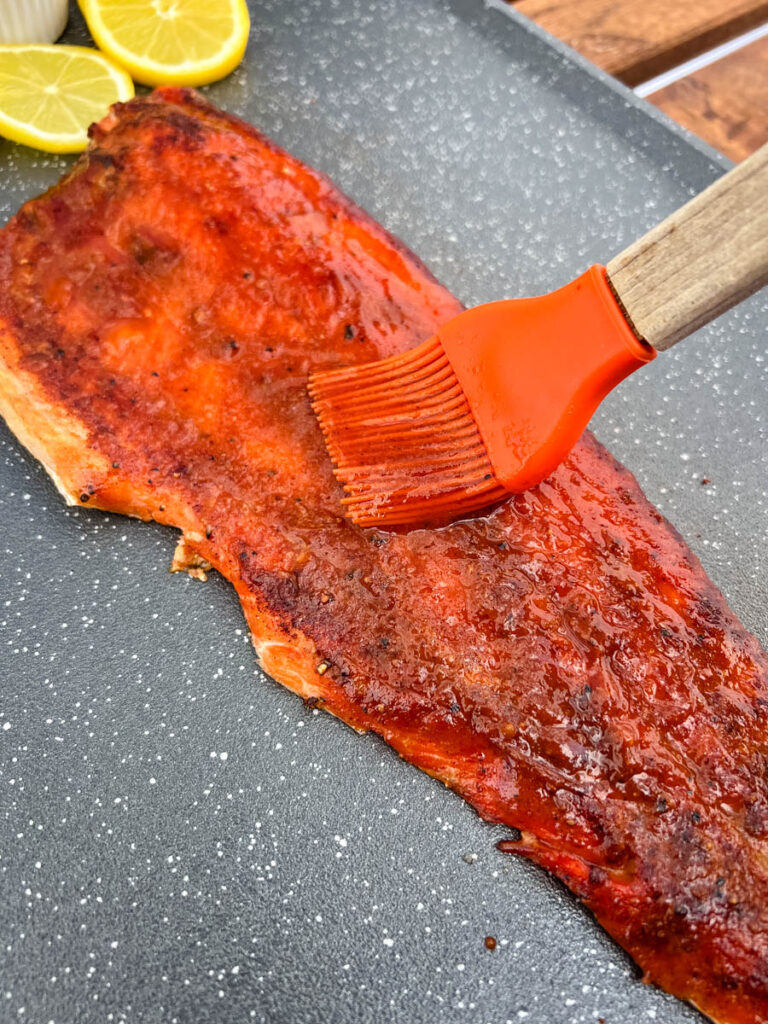 Traeger smoked salmon brushed with BBQ sauce
