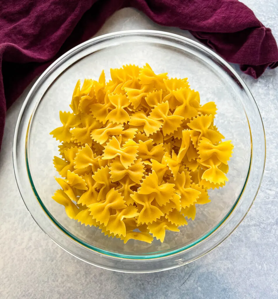 uncooked farfalle bow tie pasta in a bowl