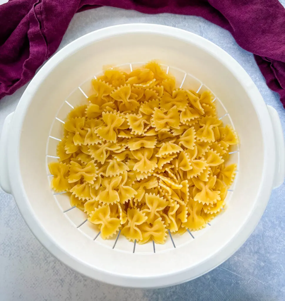 cooked farfalle bow tie pasta in a bowl