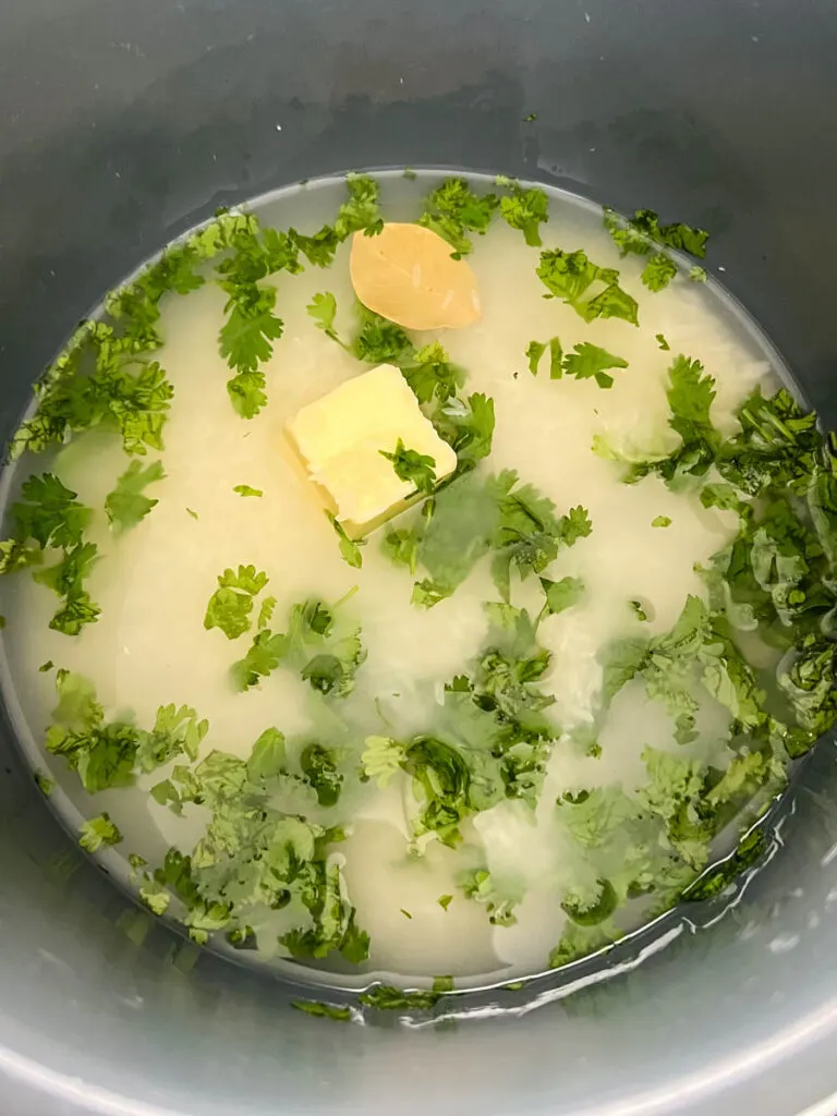 uncooked Chipotle cilantro lime rice in a pressure cooker