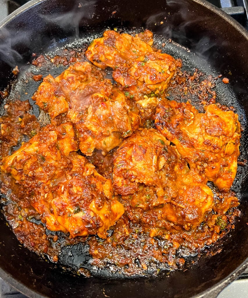 pollo asado in a cast iron skillet