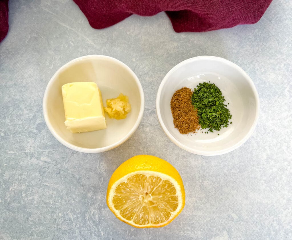 butter, garlic, parsley, Old Bay and fresh lemon in separate bowls