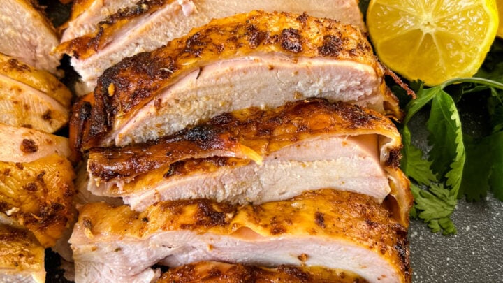 slices of smoked turkey breast on a pan