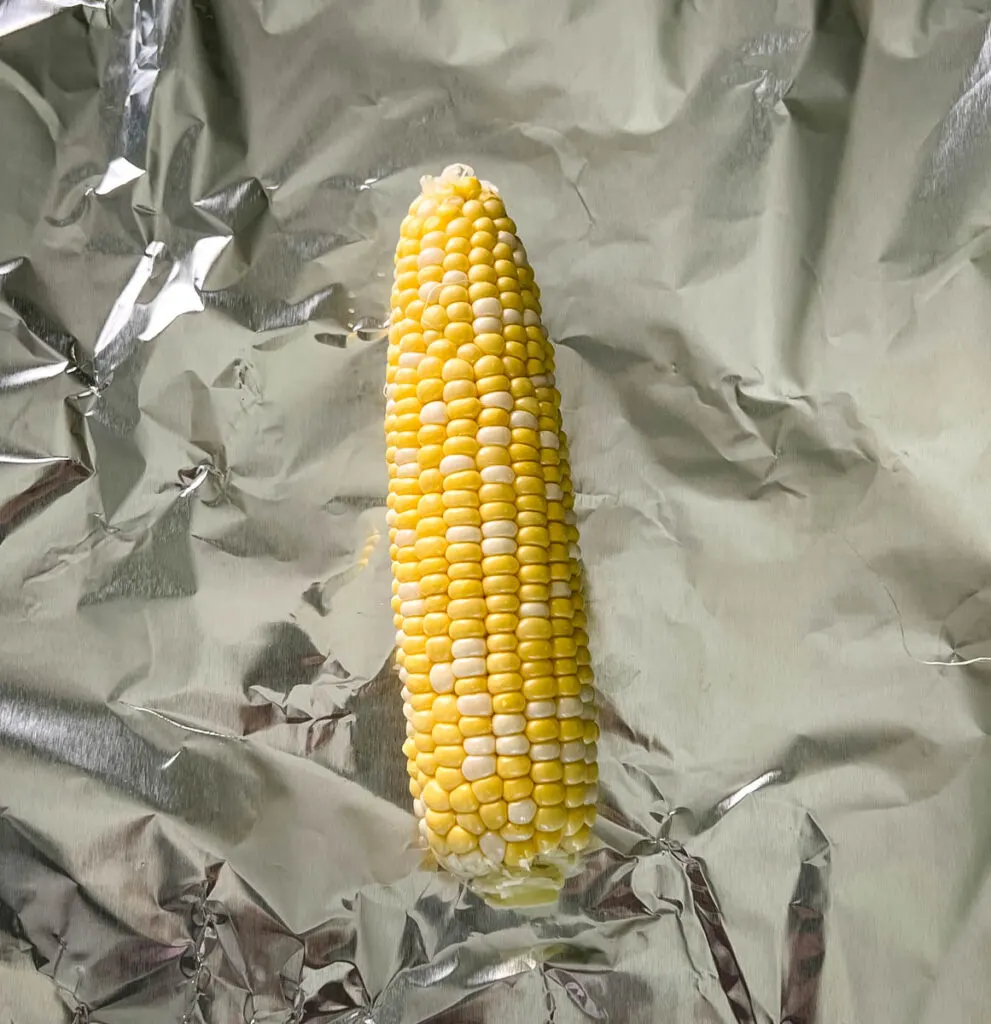 corn on the cob on foil