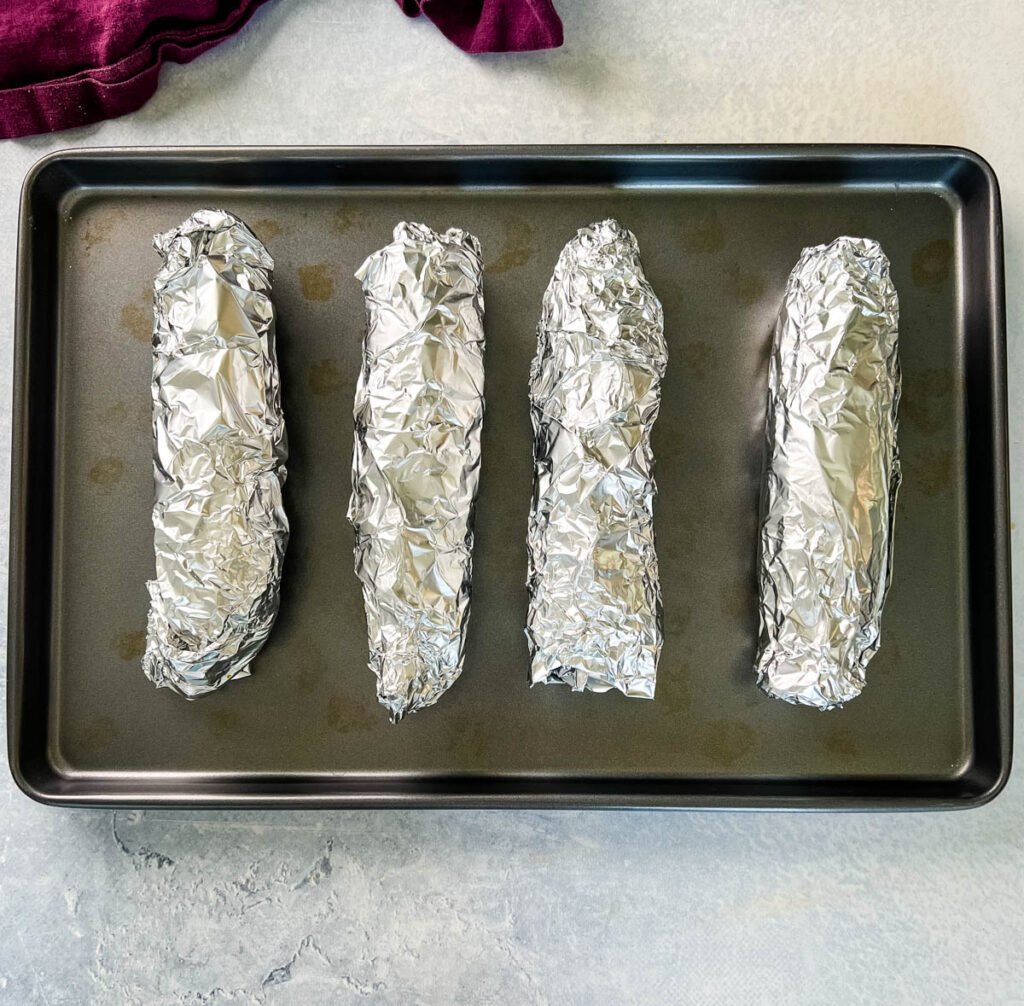 baked oven roasted corn on the cob wrapped in in foil