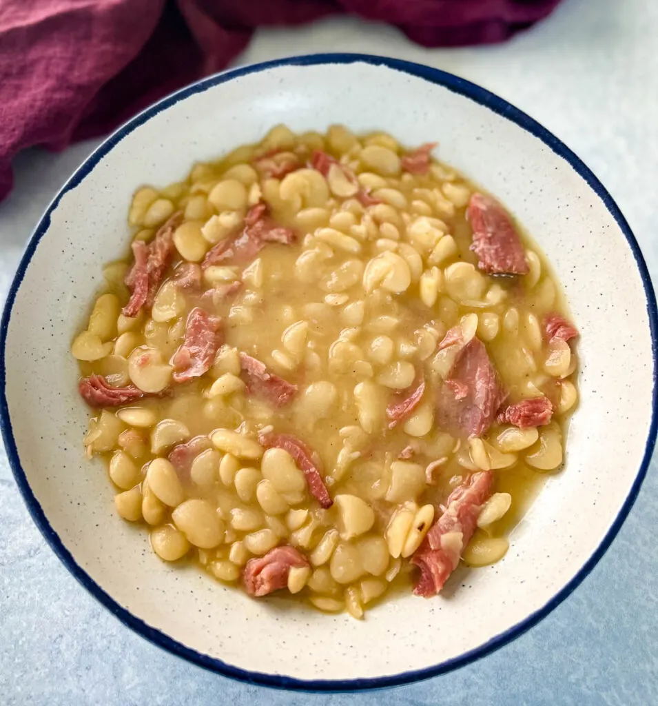 a spoonful of Southern butter lima beans in a bowl