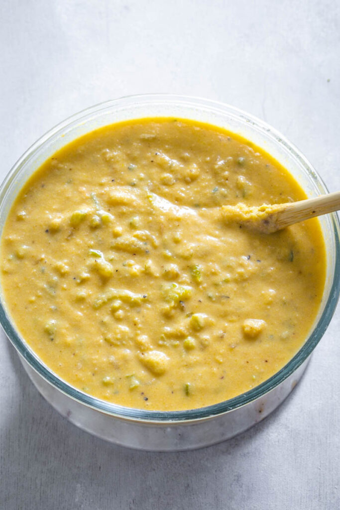 seafood cornbread dressing batter in a bowl