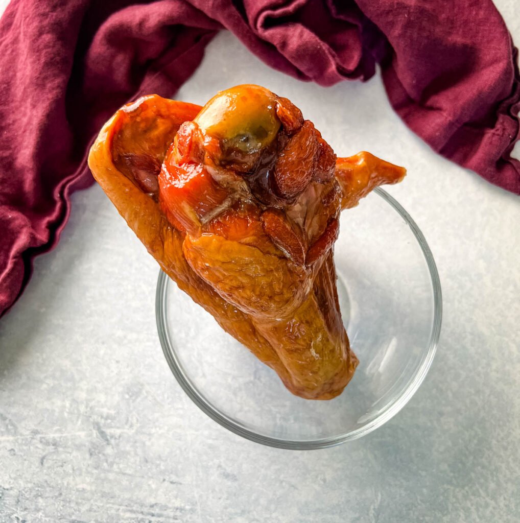 smoked turkey wing in a glass bowl