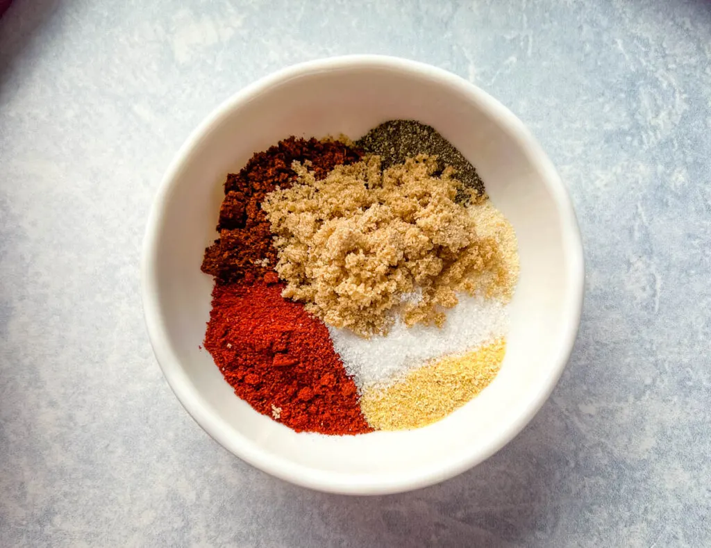 homemade bbq rub and spices in a white bowl