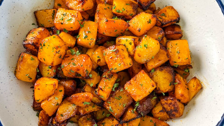 air fryer butternut squash in a white bowl