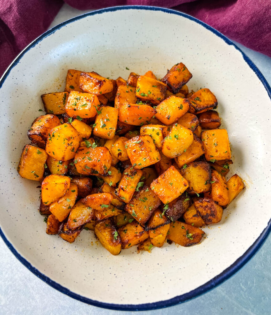 air fryer butternut squash in a white bowl