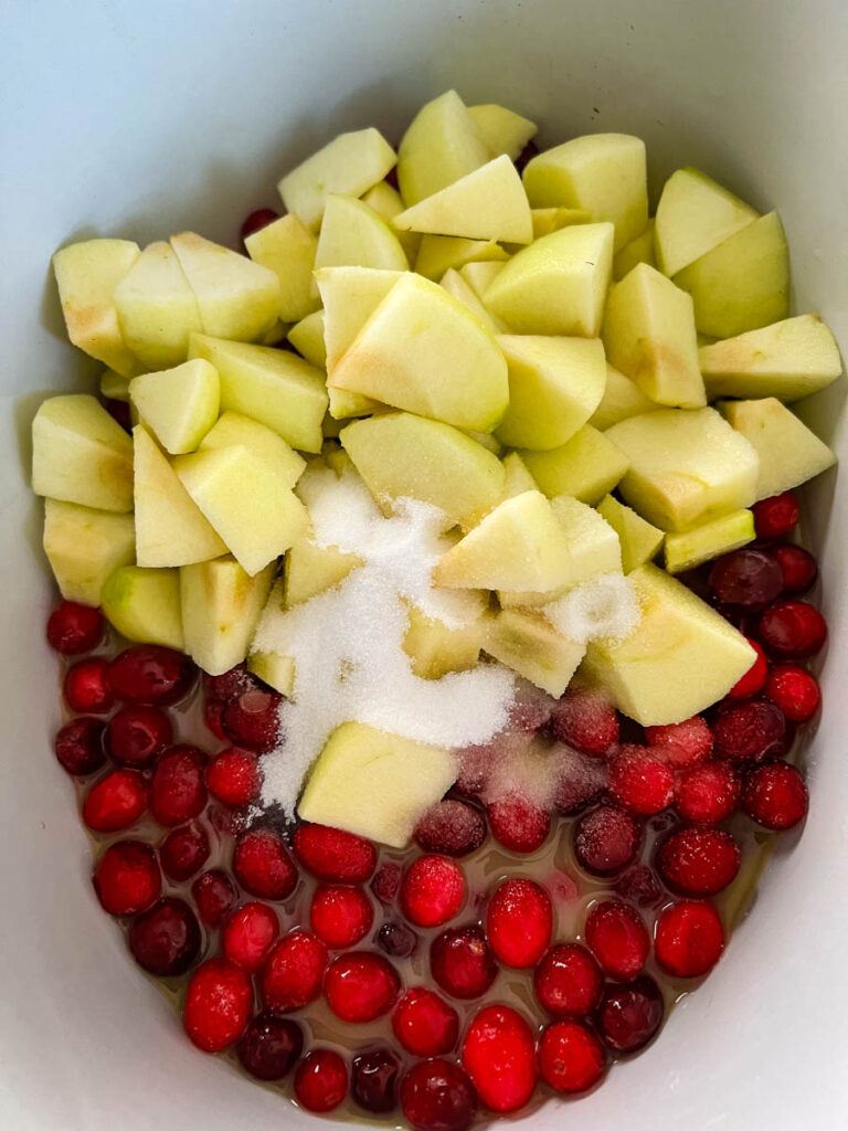 uncooked apple cranberry sauce in a pot