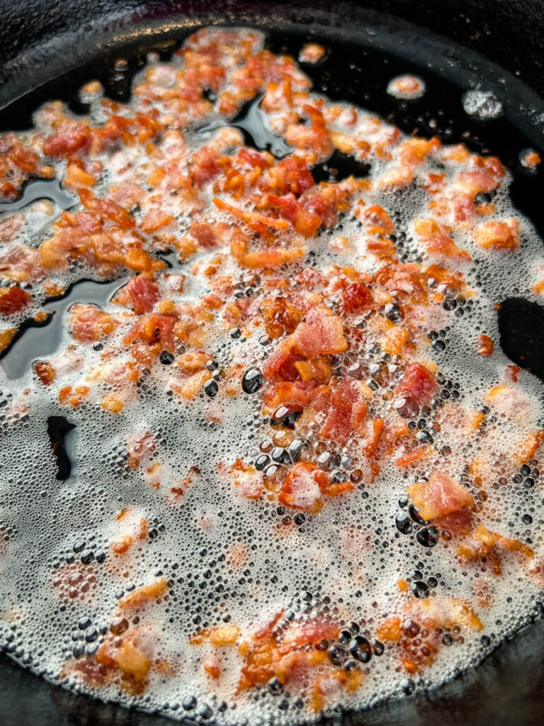 cooked bacon in a cast iron skillet
