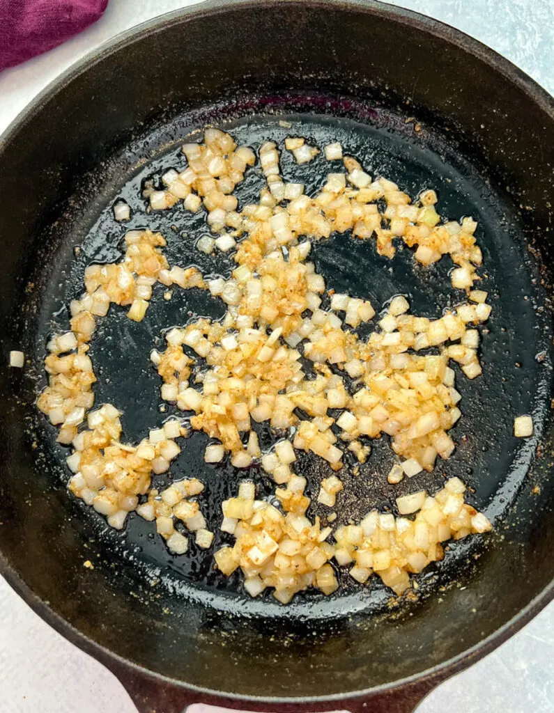 cooked onions in a cast iron skillet