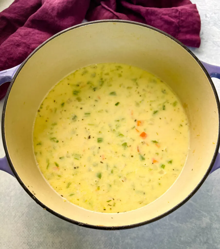 collage of Alfredo cream sauce and vegetables in a Dutch oven pot