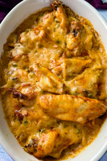 smothered chicken wings in a baking dish