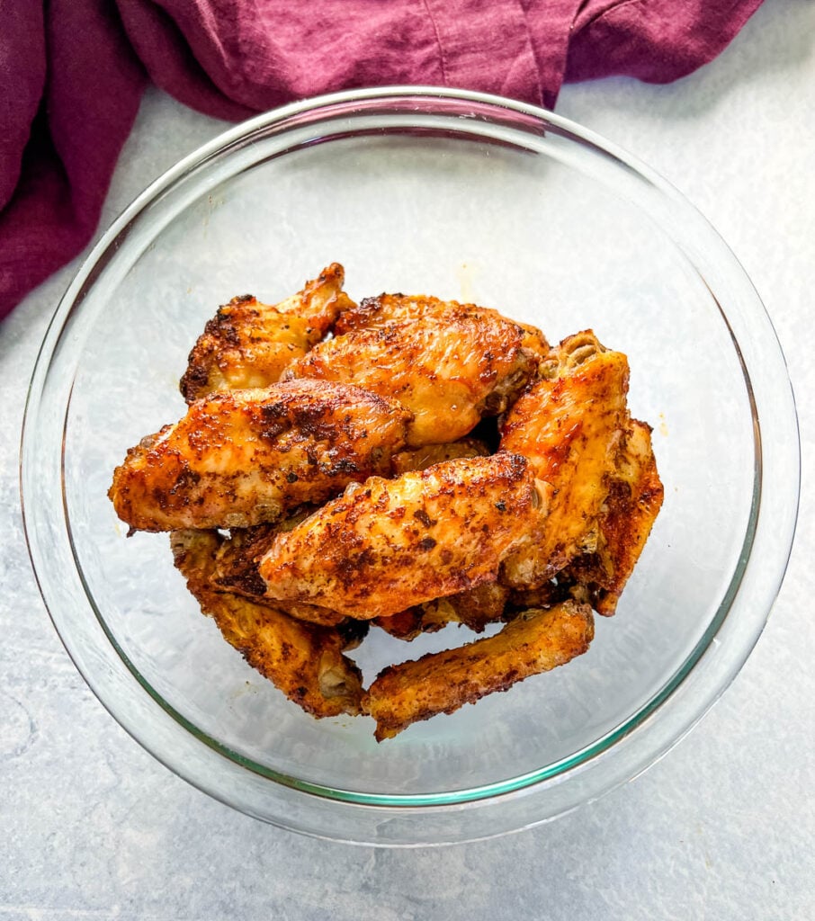 mango habanero wings in a glass bowl