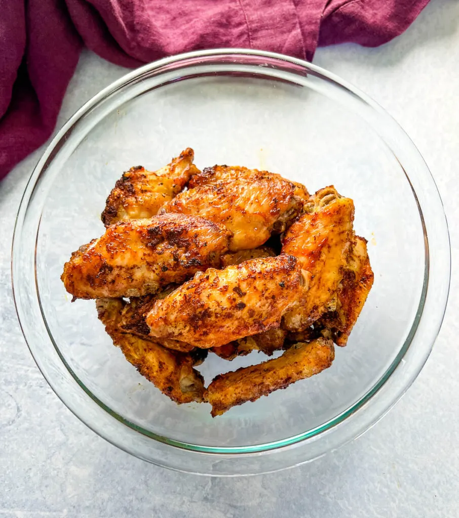 mango habanero wings in a glass bowl