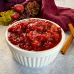 slow cooker Crockpot pot homemade cranberry sauce in a white bowl