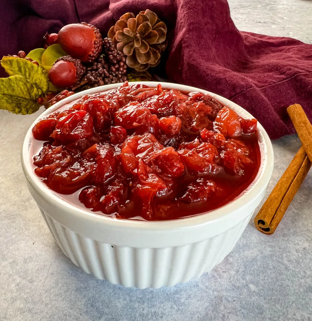 slow cooker Crockpot pot homemade cranberry sauce in a white bowl