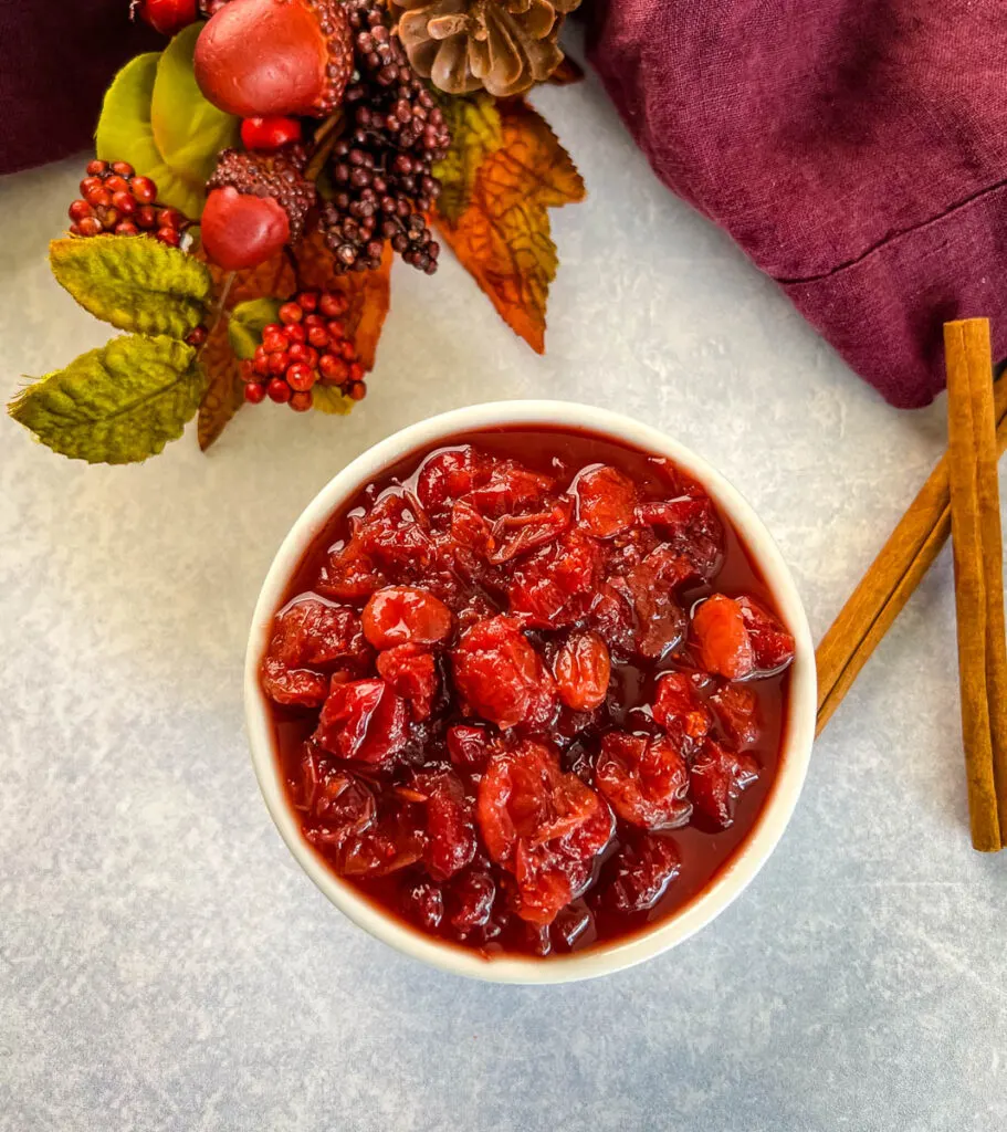 slow cooker Crockpot pot homemade cranberry sauce in a white bowl