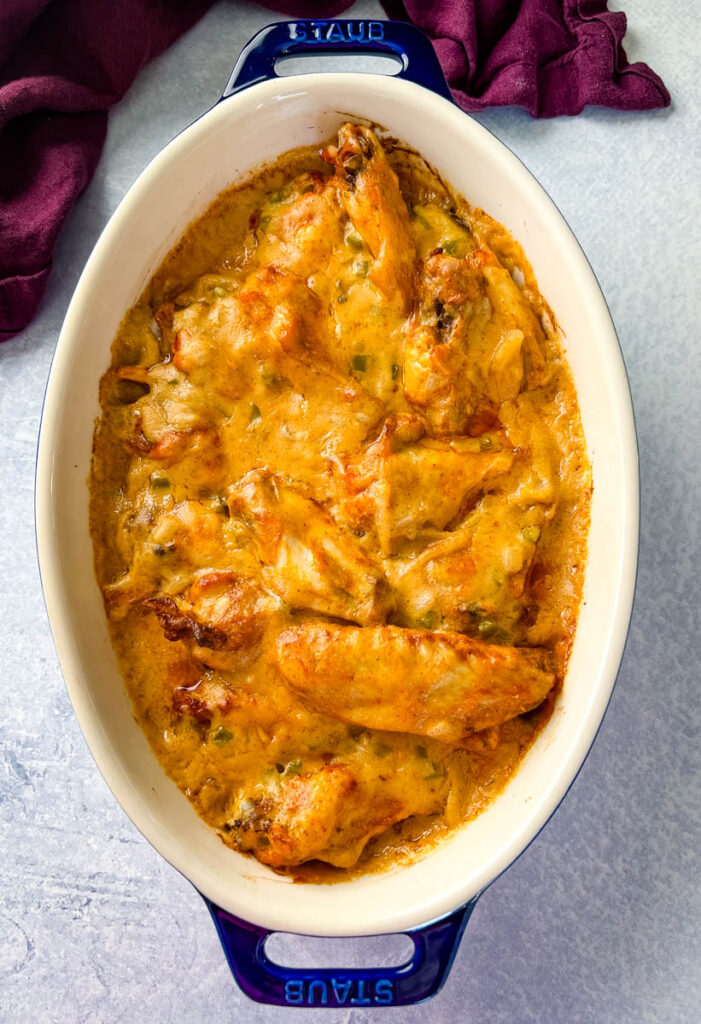 smothered chicken wings in a baking dish