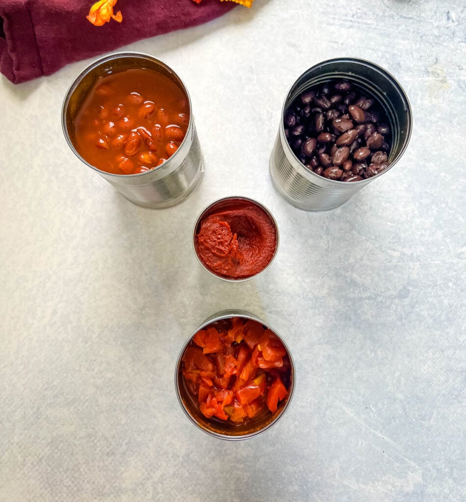 chili beans, black beans, tomato paste, and diced tomatoes in cans