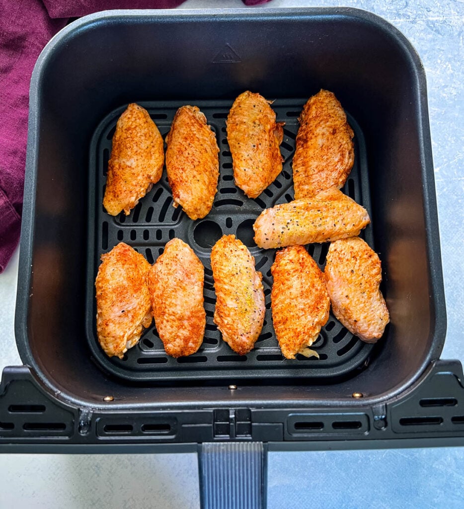 raw hot lemon pepper wings in an air fryer