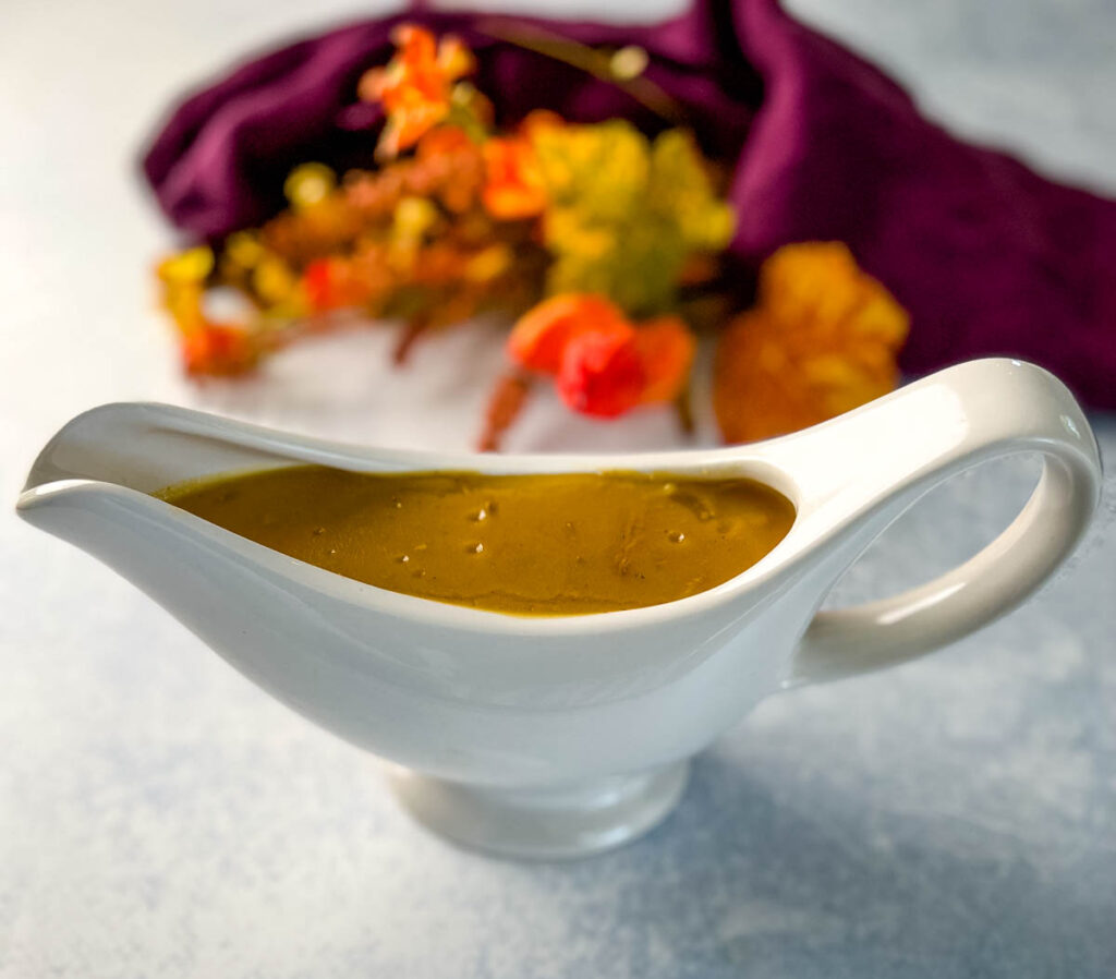 turkey gravy made from drippings in a gravy bowl