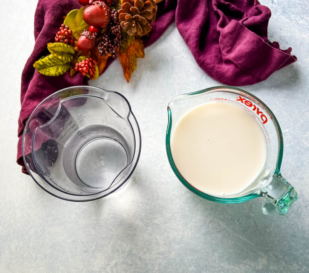 almond milk and water in separate glass cus