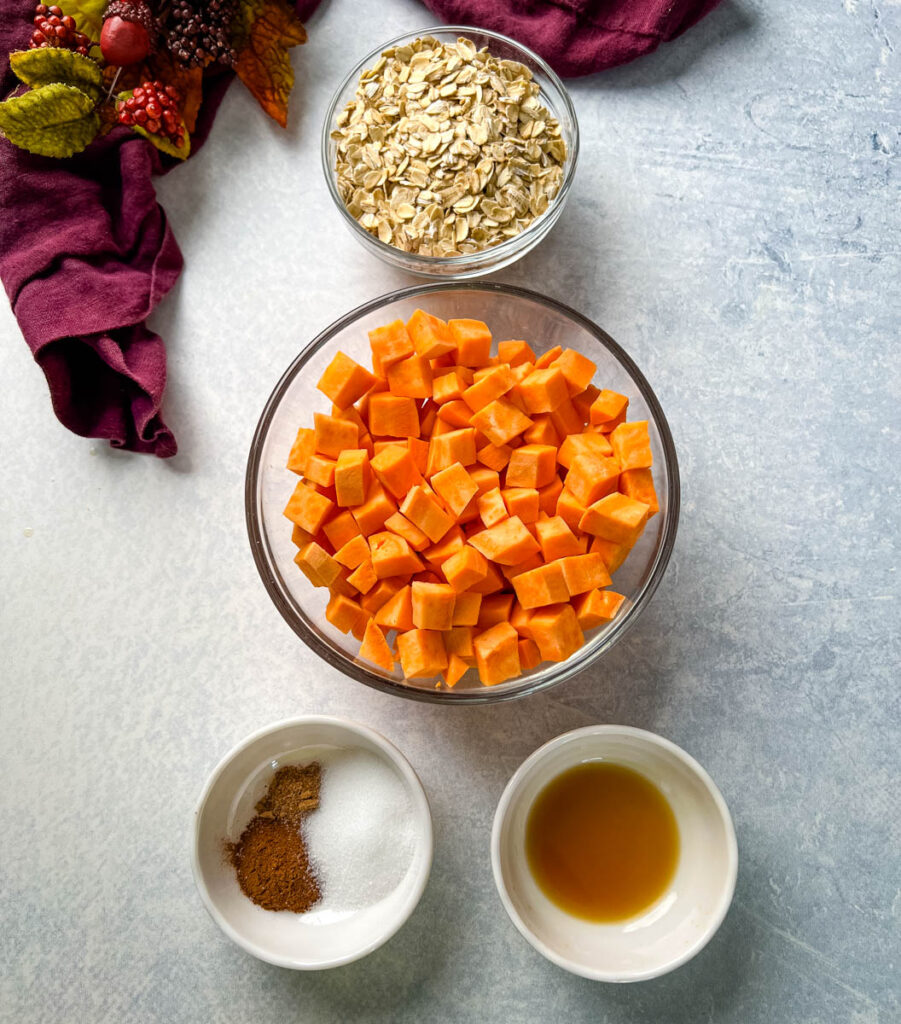 rolled oats, sweet potatoes, vanilla extract, and spices in separate bowls
