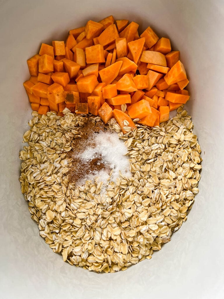 sweet potatoes, rolled oats, cinnamon, and nutmeg in a pot